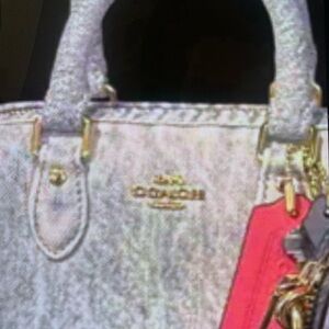 Coach Denim Rowan with Pink Tag